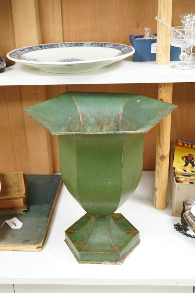 A 19th century floral painted hexagonal toleware pedestal urn, 42cm high